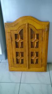 Porte miroir en bois sculpté à deux vantaux